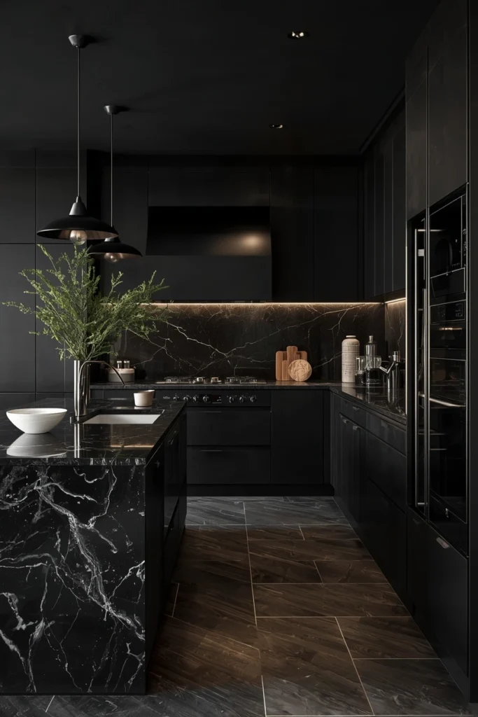 Dark navy kitchen cabinets paired with warm gold brass fixtures.